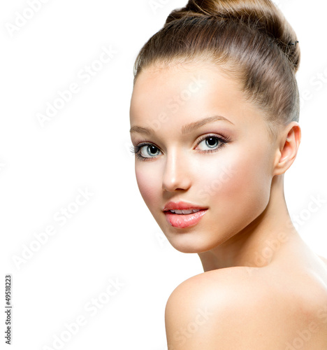 Photo: Beauty Teenage Girl Portrait isolated on a White Background Beauty Teenage Girl Portrait isolated on a White Background