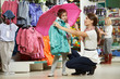 woman and little girl shopping clothes