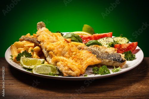 Photo: Fish dish - fried fish fillet and vegetables Fish dish - fried fish fillet and vegetables