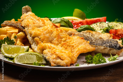 Photo: Fish dish - fried fish fillet and vegetables Fish dish - fried fish fillet and vegetables