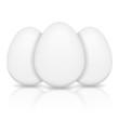 Three white eggs on white background