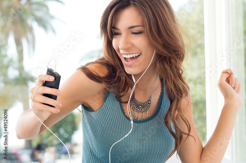 Photo: Happy Woman Listening To Music Happy Woman Listening To Music