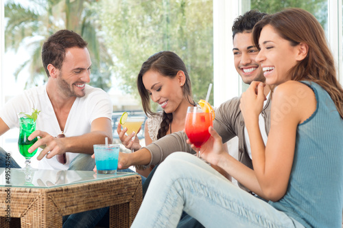 Photo: Happy Friends Drinking Juices Happy Friends Drinking Juices