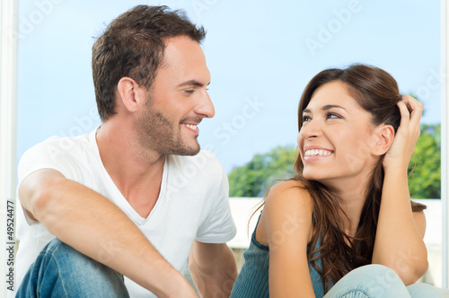 Photo: Happy Couple Having Chat Happy Couple Having Chat