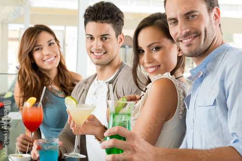Photo: Friends enjoying the aperitif Friends enjoying the aperitif