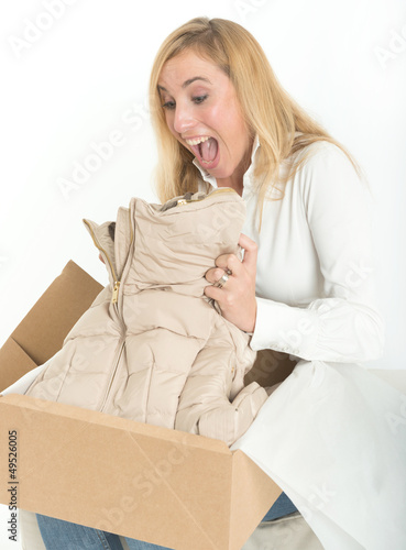 Photo: Happy woman with online purchase Happy woman with online purchase