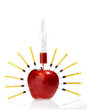 Red apple and syringes