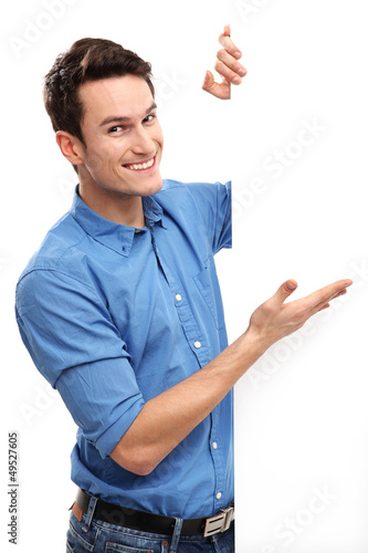 Photo: Smiling man by blank copy space Smiling man by blank copy space