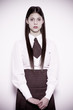 teen school girl wearing old style formal clothes