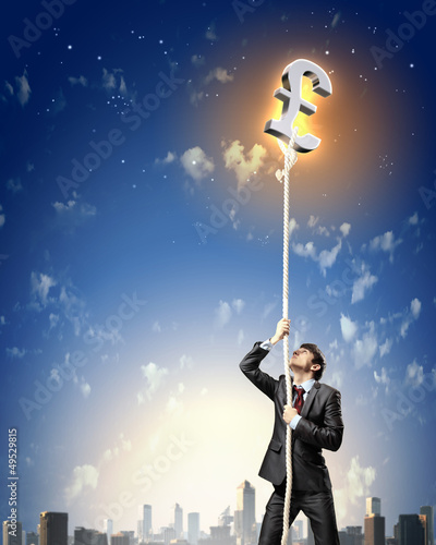 Photo: Image of businessman climbing rope Image of businessman climbing rope