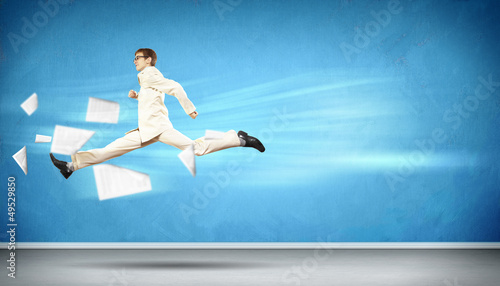 Photo: Image of running businessman Image of running businessman