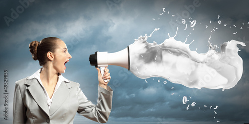Photo: businesswoman with megaphone businesswoman with megaphone