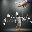 Business woman marionette