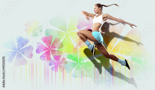 Photo: Image of sport woman jumping Image of sport woman jumping
