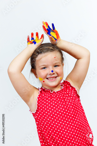 Photo: happy child with paint on the hands happy child with paint on the hands