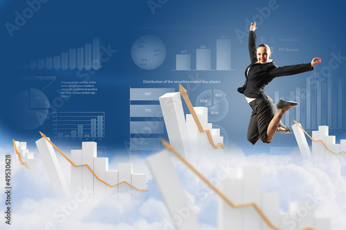 Photo: businesswoman in black suit jumping businesswoman in black suit jumping