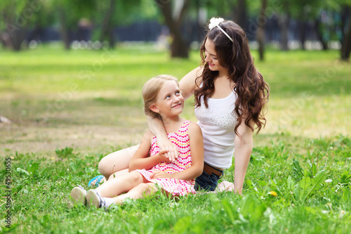 Photo: Mother and daughter in the park Mother and daughter in the park