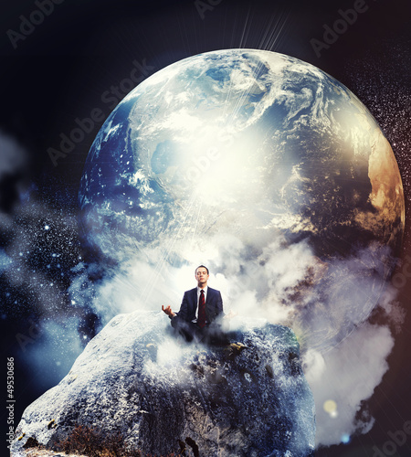 Photo: business man meditating business man meditating