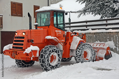 Photo: snow plough scraper to remove all the snow from the road snow plough scraper to remove all the snow from the road