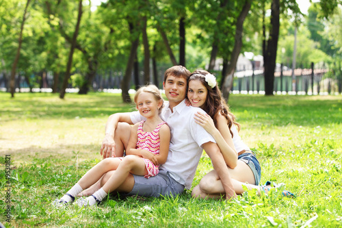 Photo: happy family having fun outdoors happy family having fun outdoors