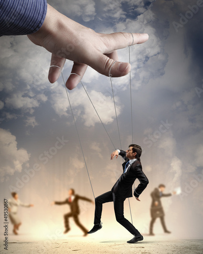 Photo: Business people marionette Business people marionette