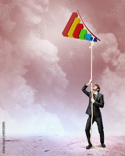 Photo: Image of businessman climbing rope Image of businessman climbing rope