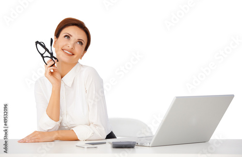 Photo: Beautiful businesswoman dayreaming Beautiful businesswoman dayreaming