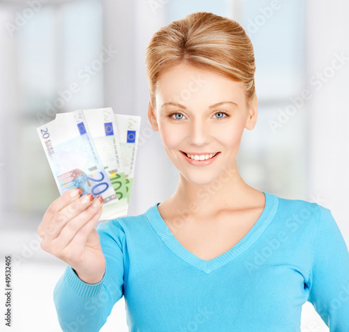 Photo: woman with euro cash money woman with euro cash money
