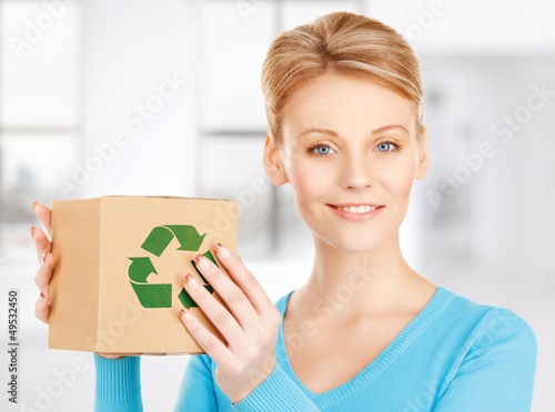 Photo: woman with recyclable box woman with recyclable box