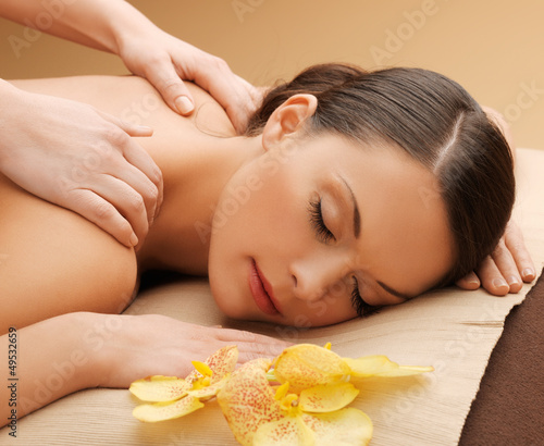 Photo: beautiful woman in massage salon beautiful woman in massage salon