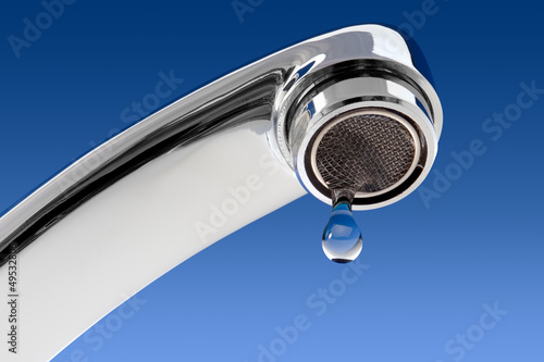 Photo: Water tap with drop. Water tap with drop.