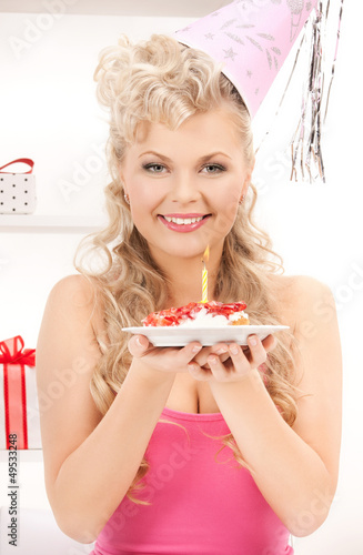 Photo: woman with birthday cake woman with birthday cake