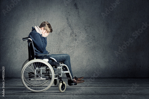 Photo: Young Man in Wheel Chair Young Man in Wheel Chair