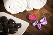 Photo: Towel next to candles and pebbles. Towel next to candles and pebbles.