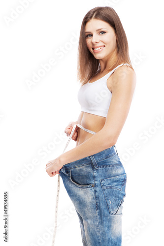 Photo: Beautiful slim woman on white background Beautiful slim woman on white background