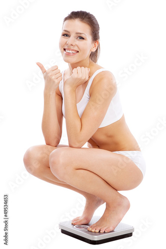 Photo: Beautiful slim woman on white background Beautiful slim woman on white background