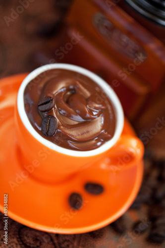 Photo: Chocolate mousse in coffee cup, selective focus Chocolate mousse in coffee cup, selective focus
