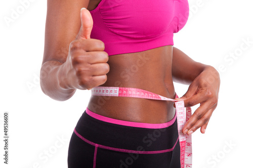 Photo: African American Fitness woman making thumbs up African American Fitness woman making thumbs up