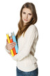 Relaxed woman holding books