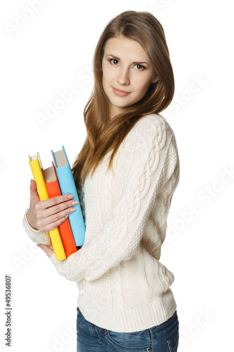 Photo: Relaxed woman holding books Relaxed woman holding books