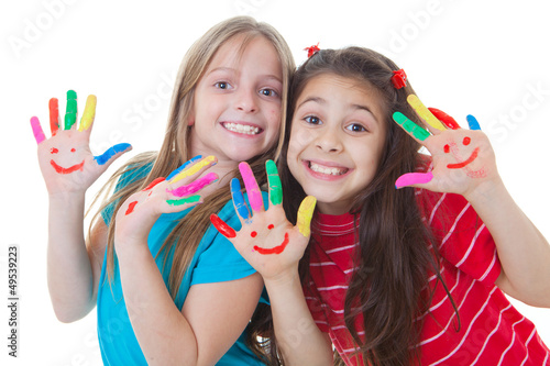 Photo: happy kids playing paint happy kids playing paint