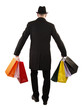 Man buyer is holding colorful shopping bags