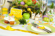 Serving Easter table on room background