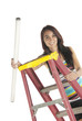 Young woman florescent bulb step ladder