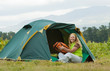 Camping happy woman