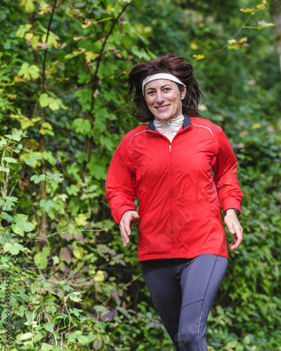 Photo: lächelnde Joggerin lächelnde Joggerin