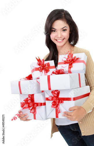 Photo: beautiful girl with a gift boxes beautiful girl with a gift boxes
