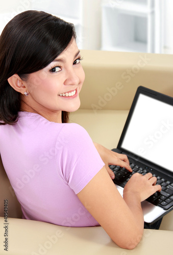 Photo: business woman using laptop business woman using laptop