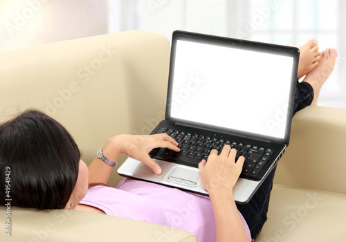 Photo: business woman using laptop business woman using laptop