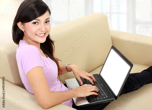 Photo: business woman using laptop business woman using laptop